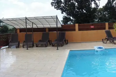 Image de Homerez - Appt Ă Deshaies avec piscine.
