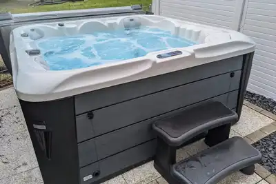 Image de Traumhafte Wohnung Über Zwei Ebenen mit Infrarotkabine, Balkon und Terrasse