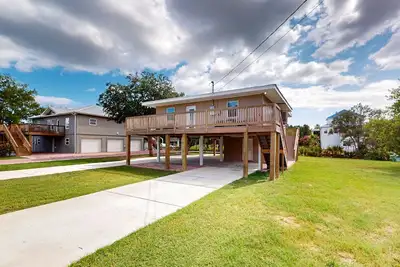 Image de Canal-front home with boat launch, kayaks, decks, & yard games - dog-friendly