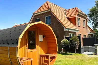 Image de LĂĽttje Huck - Ferienwohnung 2 mit Seeblick & Sauna