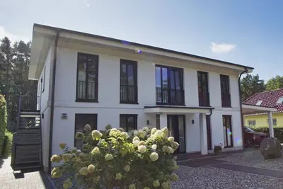 Image de Ferienwohnung Cosmo - Direkt am Waldrand mit Balkon und in Strandnähe - Ferienwohnung Cosmo