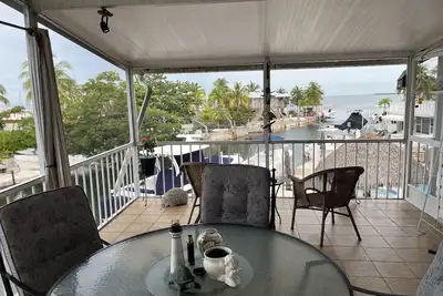 Cozy 3/2 in Upper Keys. Bring your boat and relax in this canal front home.