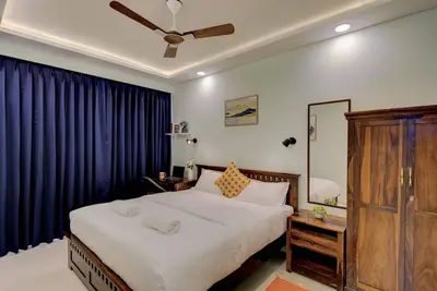 Image de 10 min from Goi airport! Family sized apartment w\/deck. Pool. Sauna. Wi-Fi.