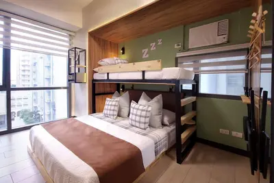 Relax to a family size condo with fun games, popcorn and cinematic movie.