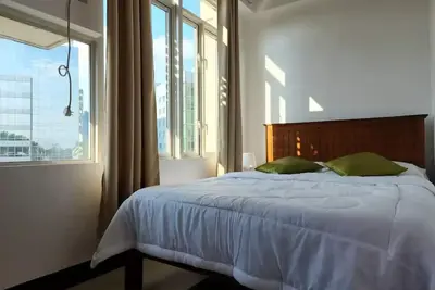 Image de Cozy Studio in Taguig w pool/gym Wi-Fi Netflix 7m\n