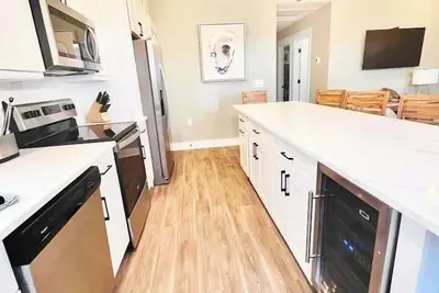 Oyster & Pearl Beautiful New Single Level Condo