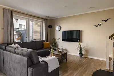 Image de 120m² Reihenhaus für 5 Pers. mit Garten, Sauna und Kamin