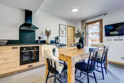 Image de À 140m des remontées, Rez-de-chaussée, terrasse, parking, télévision, casier à ski, 40m², Morzine