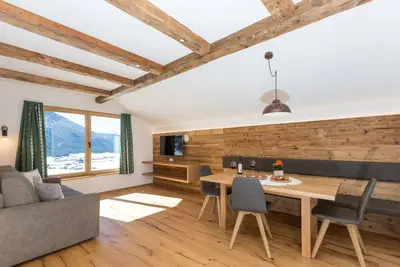 Image de Appartement 'Ausserharmerhof Wiesenglück' avec vue sur la montagne, jardin partagé et Wi-Fi
