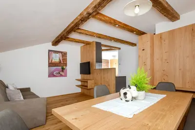Image de Appartement 'Ausserharmerhof Bergdiamant' avec vue sur la montagne, jardin partagé et Wi-Fi