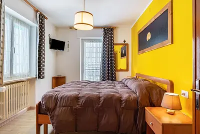 Image de Appartement \"House Cuel Milena Folgaria - Yellow\" avec vue sur la montagne et jardin partagé
