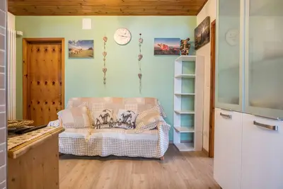 Image de Appartement \"House Cuel Milena Folgaria - Green\" avec vue sur la montagne et jardin partagé