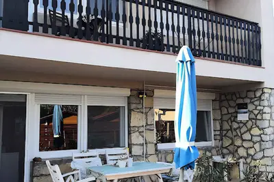 Image de Appartement de vacances avec une grande terrasse et une vue sur les montagnes
