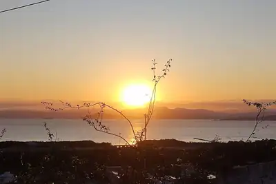 Image de Pôr do sol Entre o Aeroporto e o Centro - Rota Para as Praias do sul