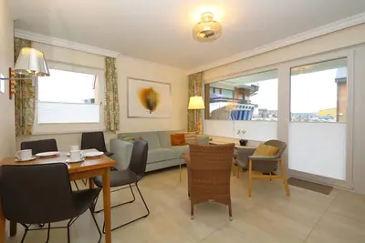 Image de This comfortable vacation apartment is sheltered behind the dune directly at the beach crossing to the Westerland promenade. Friedrichstraße is a 3-minute walk away.