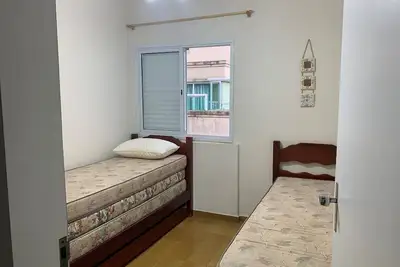 Image de 2u Tour - Guarujá - pé na Areia e Shopping