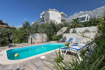 Image de Appartement de vacances Makarska pour 1 - 7 personnes avec 3 chambres Ă coucher - Maison de vacances