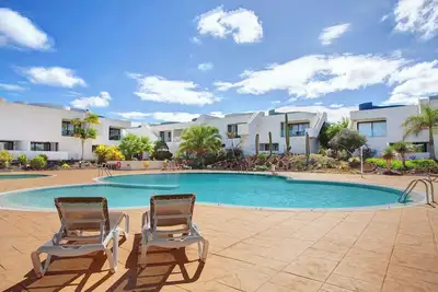 Image de Maison de vacances 'Le secret du jardin' avec piscine partagée, terrasse privée et Wi-Fi