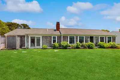 Image de Home near beach & tennis/basketball court with firepit, grill, & patio