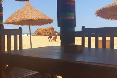 Image de Pieds dans l'eau : Grand studio avec 2 lits double et terrasse devant l'océan