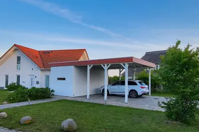 Image de Ferienhaus Meerfreude - Modernes Ferienhaus mit Kamin, Garten und Eigener Sauna - Ferienhaus