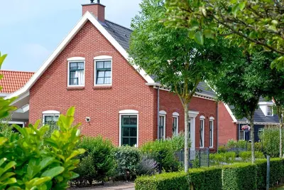 Luxury detached villa for 10 people with sauna and whirlpool in a small-scale park on the Zeeland coast