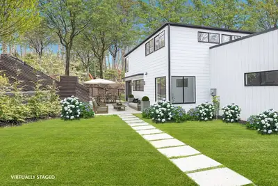 Image de Designer beach house with private beach rights, pool and brand new everything