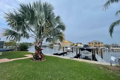 3 Bed 3 Bath home with pool and dock on large quiet canal in Gulf Harbors