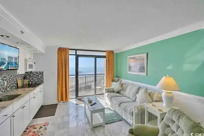 Image de Cozy ocean front condo w/ Relaxing Pool + Cozy King Bed